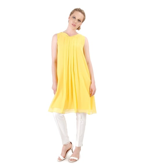 Tinuta eleganta cu rochie din voal si pantaloni pana