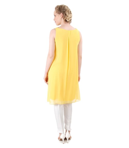 Tinuta eleganta cu rochie din voal si pantaloni pana